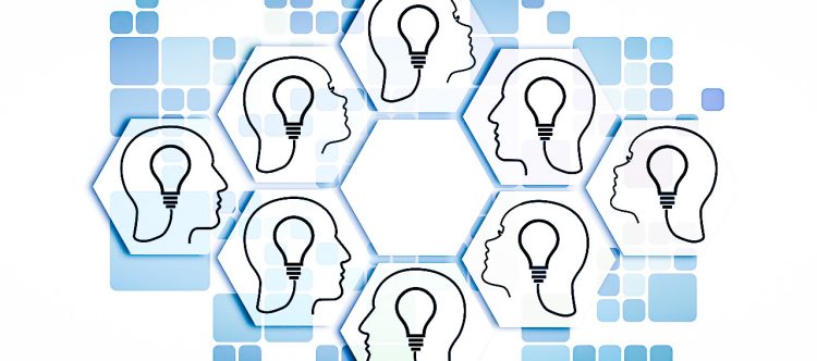 graphic of several peoples heads with lightbulbs inside them, symbolising the power of collaboration